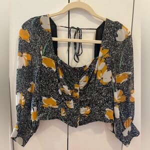 Astr the Label black and white blouse with yellow/white flowers